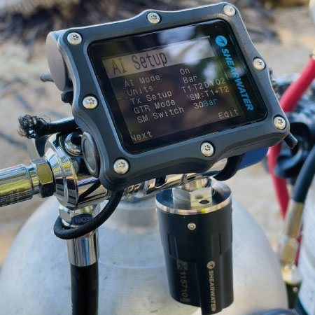 https://dev.thehonestdiver.com/wp-content/uploads/2022/11/Shearwater-Perdix-2-Black-Ti-Dive-Computer-With-Transmitter.jpg
